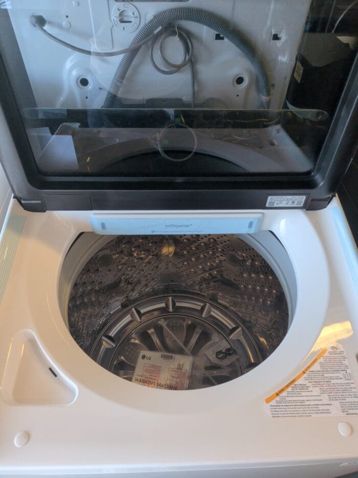 LG set DLE8400WE 7.3 cu. ft. Ultra Large Capacity Rear Control Electric Dryer  Door and AI Sensing and  WT8600CW 5.5 cu. ft. Mega Capacity Smart Top Load Washer with Impeller, EasyUnload  Water Faucet & LCD Digital Dial Control - Image 4