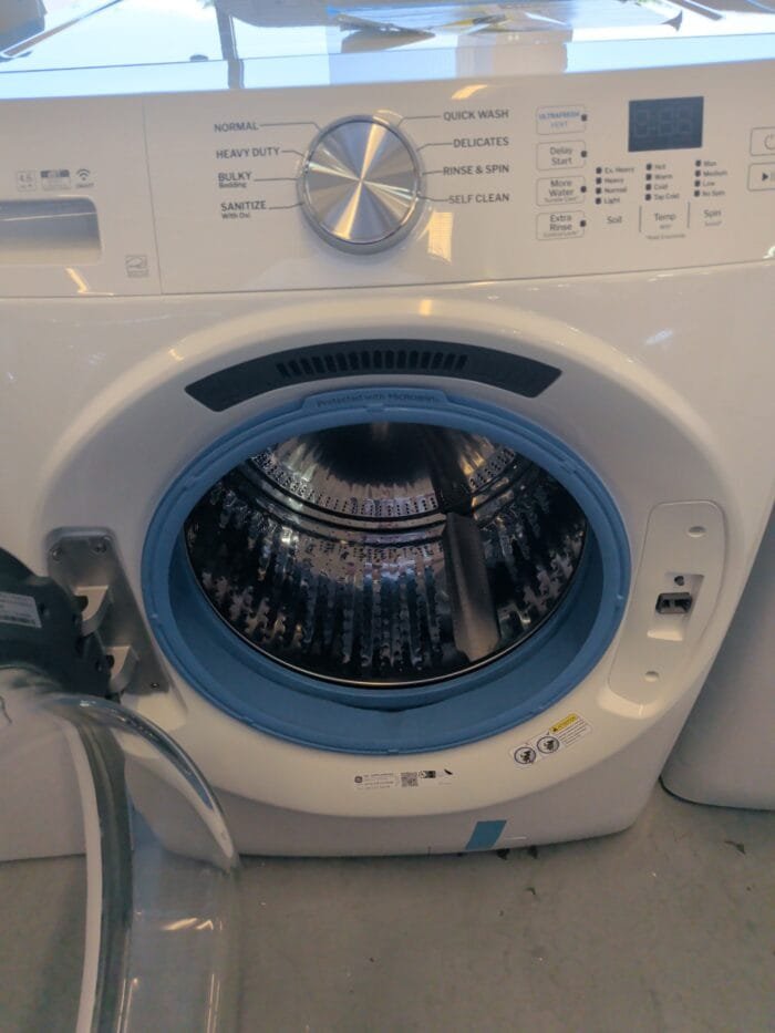 GE GFW350SSYWW 4.6 cu. ft. Smart Front Load Washer in White with UltraFresh Vent System and OdorBlock & GFD35ESSYWW 7.8 cu. ft. Capacity Smart Front Load Electric Dryer - Image 9